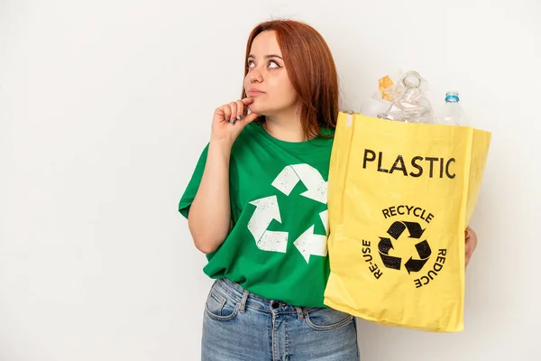 Young Caucasian Woman Recycled Plastic Isolated White Background Looking Sideways — Fotografia de Stock