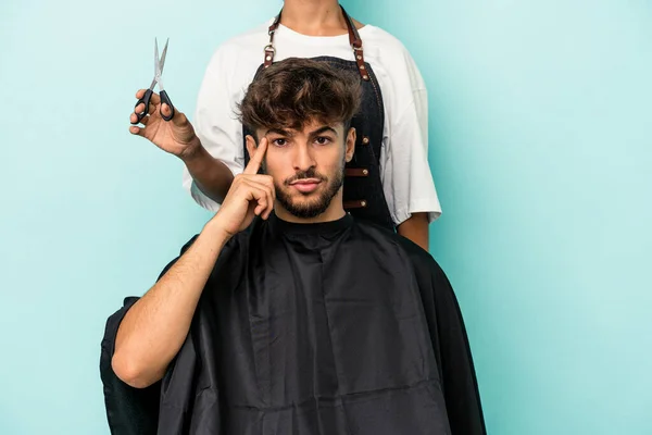 Young Arab Man Ready Get Haircut Isolated Blue Background Pointing — 图库照片