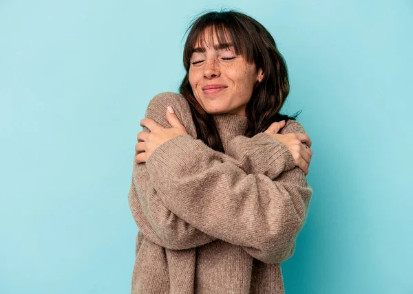 Young Argentinian Woman Isolated Blue Background Hugs Smiling Carefree Happy — Foto de Stock
