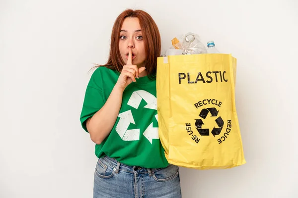 Young Caucasian Woman Recycled Plastic Isolated White Background Keeping Secret — 图库照片