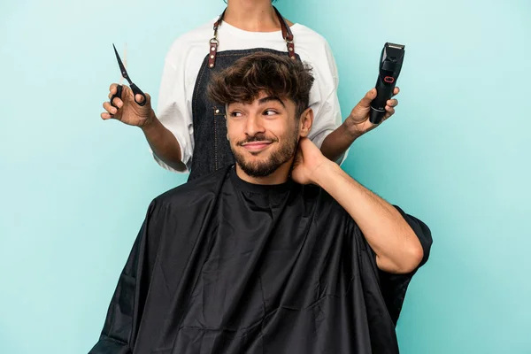 Young Arab Man Ready Get Haircut Isolated Blue Background Touching — Stock Photo, Image