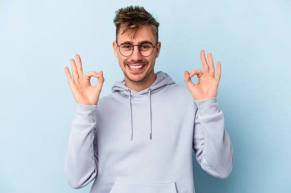 Young Caucasian Man Isolated Blue Background Cheerful Confident Showing Gesture — Stock Photo, Image
