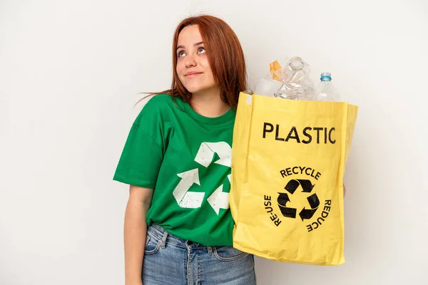 Young Caucasian Woman Recycled Plastic Isolated White Background Dreaming Achieving — Fotografia de Stock