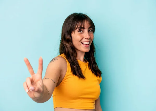 Young Argentinian Woman Isolated Blue Background Joyful Carefree Showing Peace —  Fotos de Stock