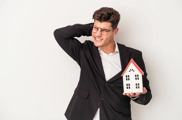 Young Real Estate Caucasian Agent Isolated White Background Touching Back — Stock Photo, Image