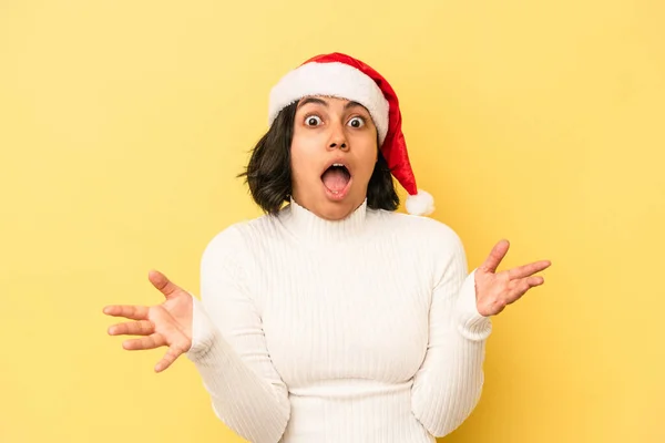 Young Latin Woman Celebrating Christmas Isolated Yellow Background Receiving Pleasant — Stock Photo, Image