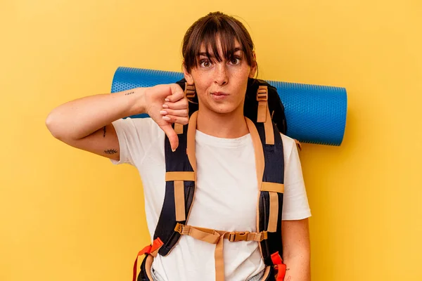 Young Argentinian Hiker Woman Isolated Yellow Background Showing Dislike Gesture — Photo