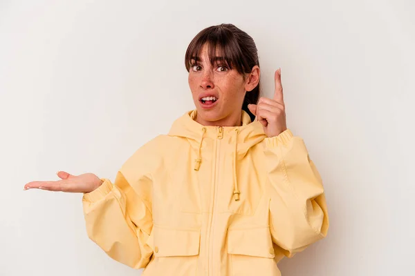 Young Argentinian Woman Isolated White Background Holding Showing Product Hand — ストック写真