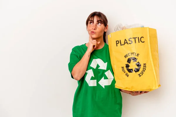 Young Argentinian Woman Recycled Plastic Isolated White Background Looking Sideways —  Fotos de Stock