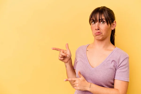 Young Argentinian Woman Isolated Yellow Background Shocked Pointing Index Fingers — ストック写真