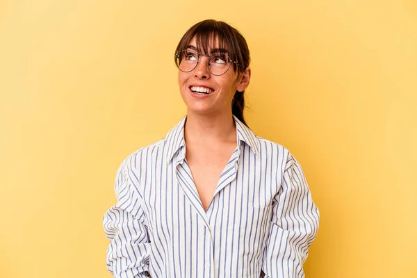 Young Argentinian Woman Isolated Yellow Background Relaxed Happy Laughing Neck — стокове фото