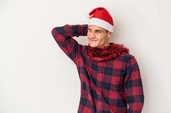Young Caucasian Man Celebrating Christmas Isolated White Background Touching Back — Stock Photo, Image