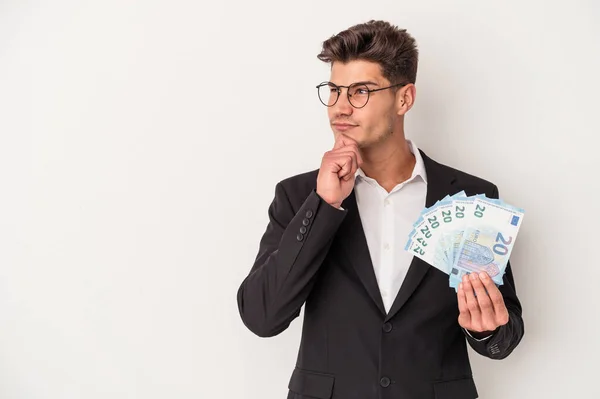 Young Business Caucasian Man Holding Banknotes Isolated White Background Looking — Stock Photo, Image
