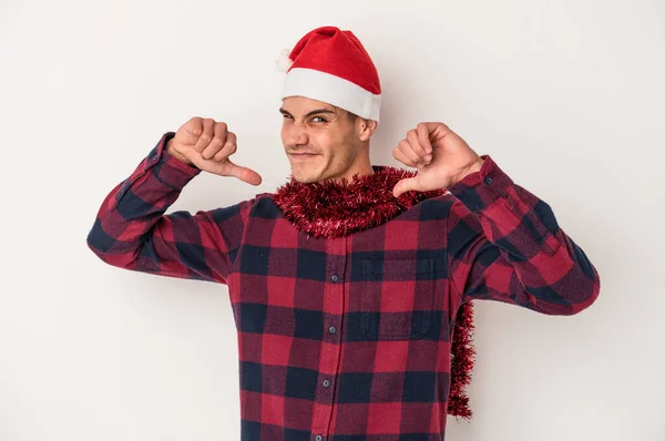 Young Caucasian Man Celebrating Christmas Isolated White Background Feels Proud — Stock Photo, Image