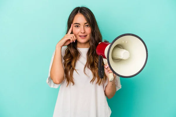 Young Caucasian Woman Holding Megaphone Isolated Blue Background Pointing Temple — Photo