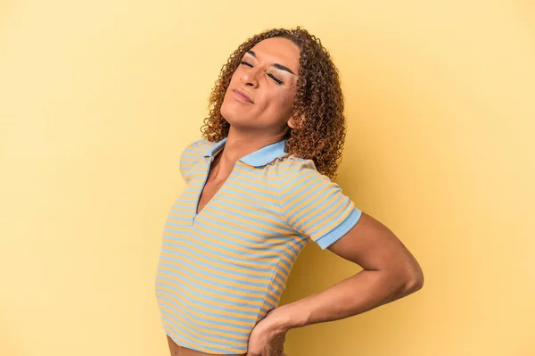 Young Latin Transsexual Woman Isolated Yellow Background Suffering Back Pain — Stock Photo, Image
