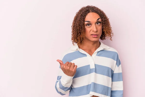 Young Latin Transsexual Woman Isolated Pink Background Shocked Pointing Index — Stock Photo, Image