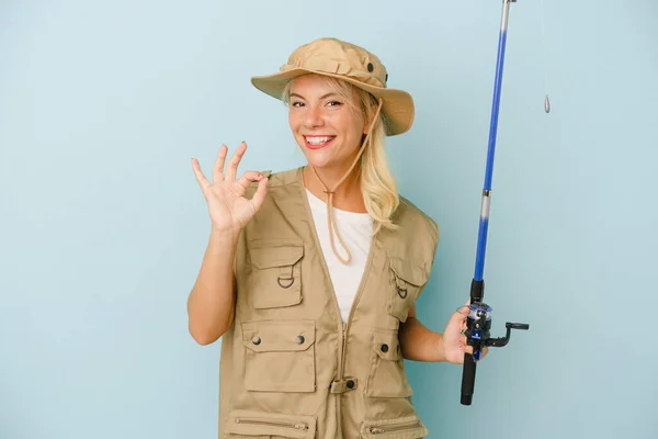 Young Russian Fisherwoman Isolated Blue Background Cheerful Confident Showing Gesture — Stock Photo, Image