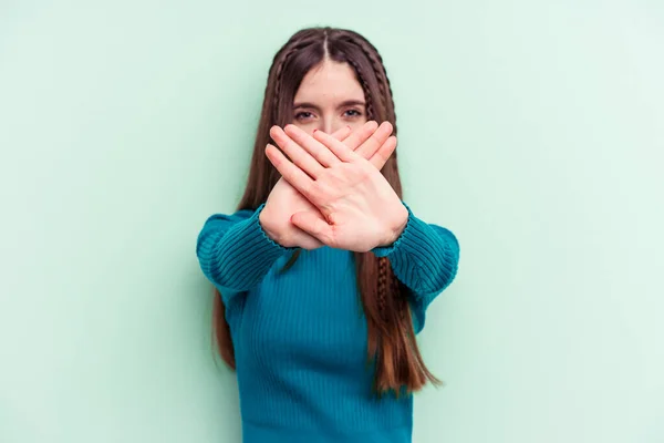 Young Caucasian Woman Isolated Green Background Doing Denial Gesture — Stock Photo, Image