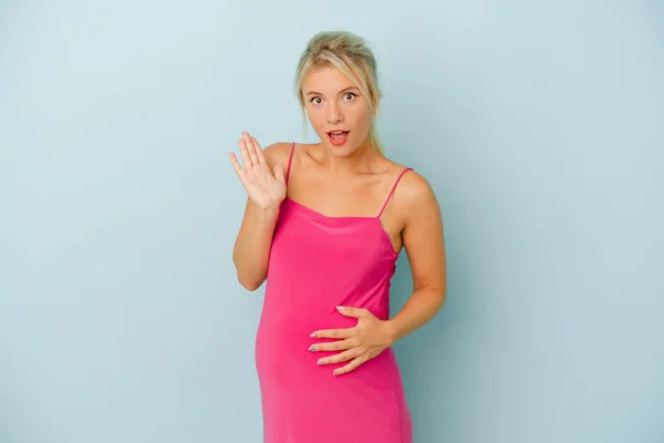 Young Russian Woman Pregnant Isolated Blue Background Surprised Shocked — Stock Photo, Image