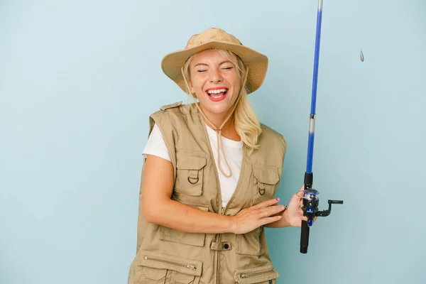 Young Russian Fisherwoman Isolated Blue Background Laughing Having Fun — Stock Photo, Image