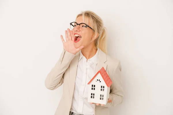 Young Real Estate Agent Woman Holding Home Model Isolated White — Stock Photo, Image