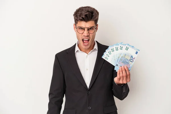 Young Business Caucasian Man Holding Banknotes Isolated White Background Screaming — Stock Photo, Image