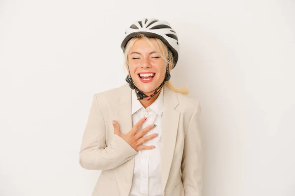 若いですビジネスロシア人女性保持自転車ヘルメット隔離上の白い背景笑アウト大声で維持手上の胸 — ストック写真