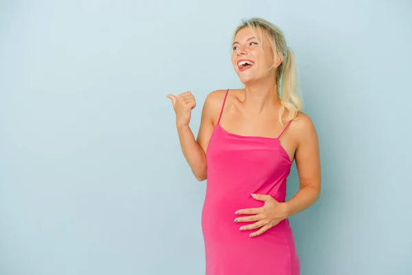 Young Russian Woman Pregnant Isolated Blue Background Points Thumb Finger — Stock Photo, Image