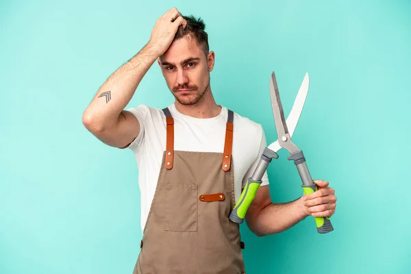 Young Gardener Caucasian Man Holding Scissors Isolated Blue Background Being — Stock Photo, Image