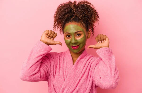 Young African American Woman Wearing Bathrobe Facial Mask Isolated Pink — Stock Photo, Image