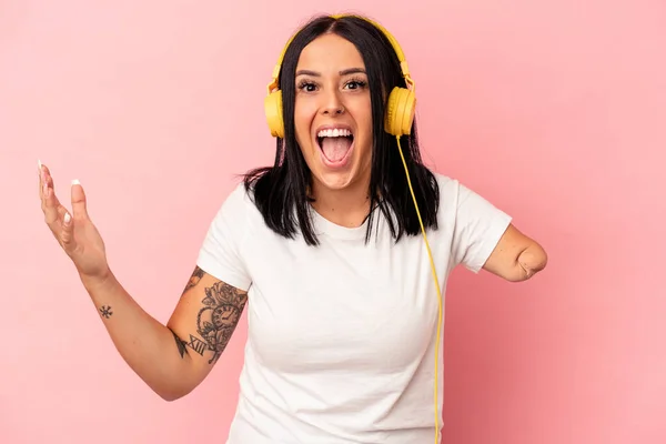 Young Caucasian Woman One Arm Listening Music Isolated Pink Background — Stock Photo, Image
