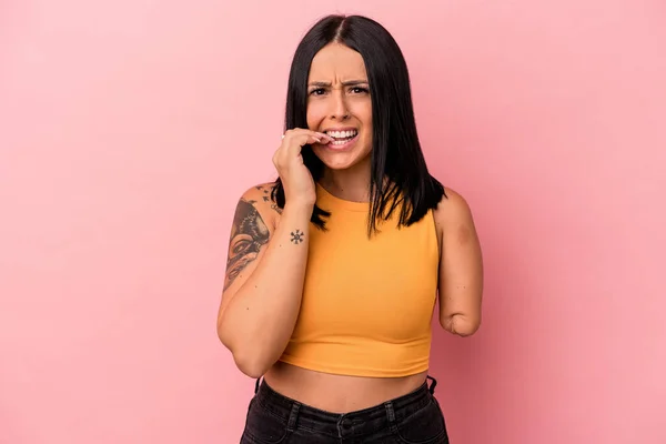 Young Caucasian Woman One Arm Isolated Pink Background Biting Fingernails — Stock Photo, Image