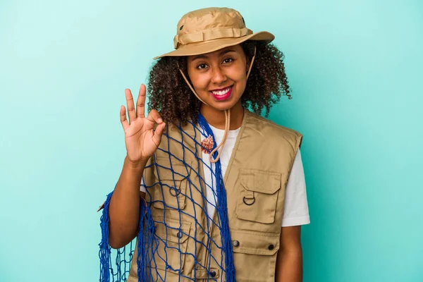 Young African American Fisherwoman Holding Net Isolated Blue Background Cheerful — Stock Photo, Image