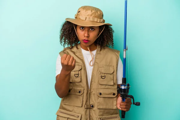 Young African American Fisherwoman Holding Rod Isolated Blue Background Showing — Stock Photo, Image