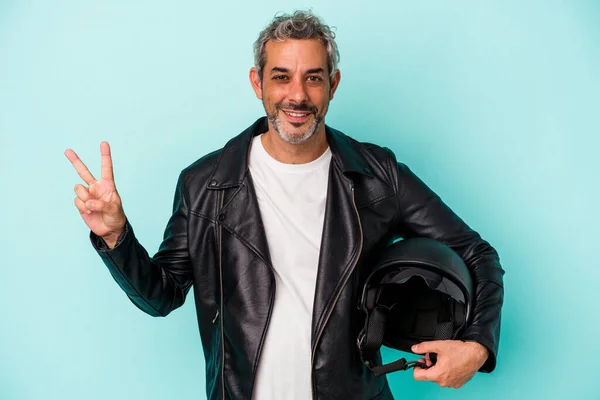 Middle Age Biker Caucasian Man Holding Helmet Isolated Blue Background — Foto de Stock