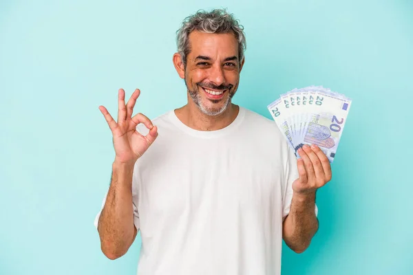 Middle Age Caucasian Man Holding Bills Isolated Blue Background Cheerful — Stock Photo, Image