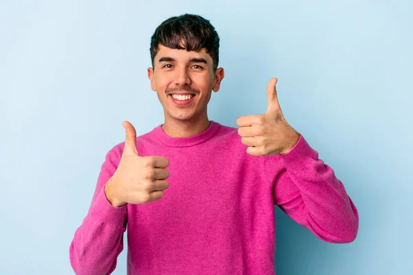 Joven Hombre Raza Mixta Aislado Sobre Fondo Azul Levantando Ambos —  Fotos de Stock