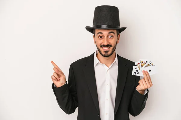 Young Magician Man Holding Magic Card Isolated White Background Smiling — Stock Photo, Image