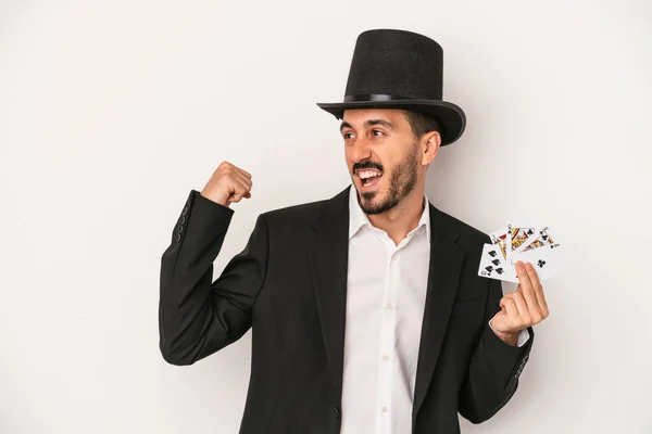 Young Magician Man Holding Magic Card Isolated White Background Raising — Stock Photo, Image