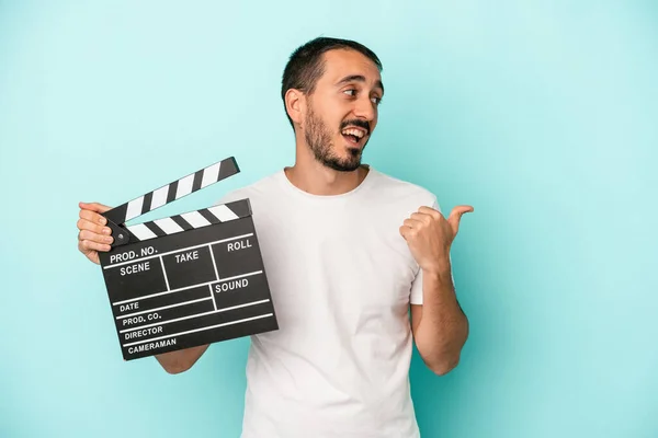 Young Caucasian Actor Man Holding Clapperboard Isolated Blue Background Points — Stock Photo, Image