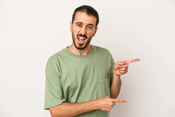 Young Caucasian Man Isolated White Background Pointing Forefingers Copy Space — Stock Photo, Image