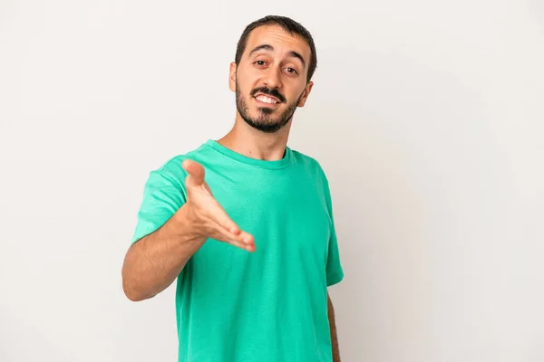 Young Caucasian Man Isolated White Background Stretching Hand Camera Greeting — Stock Photo, Image