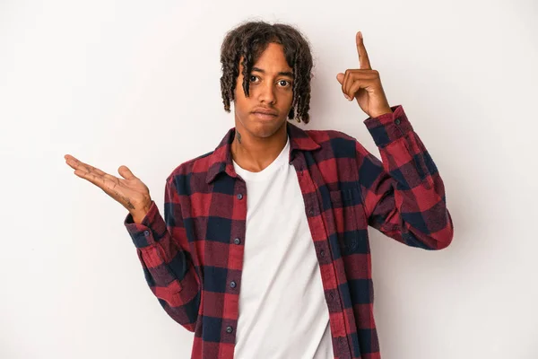 Young African American Man Isolated White Background Holding Showing Product — Stock Photo, Image