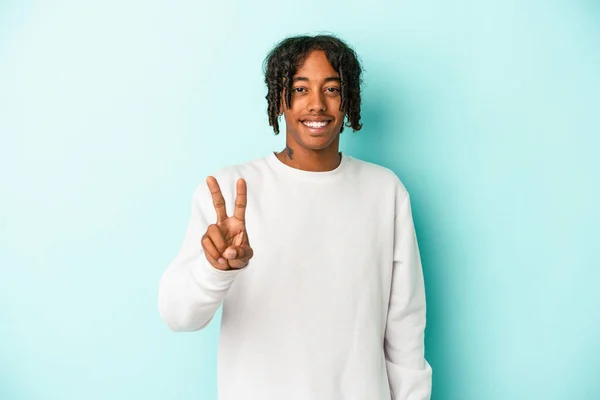 Young African American Man Isolated Blue Background Showing Victory Sign — Stock Photo, Image
