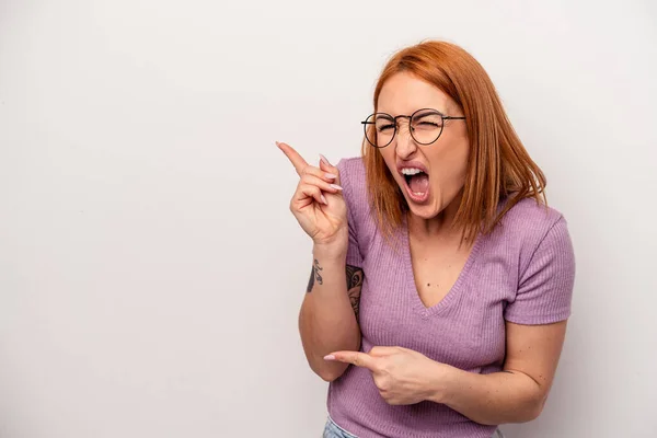 Young Caucasian Woman Isolated White Background Pointing Forefingers Copy Space — Stock Photo, Image