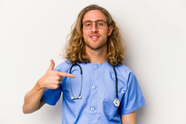 Young Nurse Caucasian Man Isolated Blue Background Person Pointing Hand — Stock Photo, Image