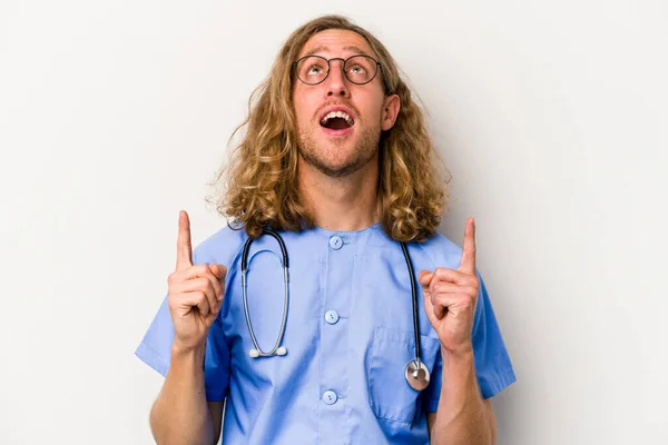Young Nurse Caucasian Man Isolated Blue Background Pointing Upside Opened — Stock Photo, Image