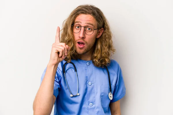 Young Nurse Caucasian Man Isolated Blue Background Having Idea Inspiration — Stock Photo, Image