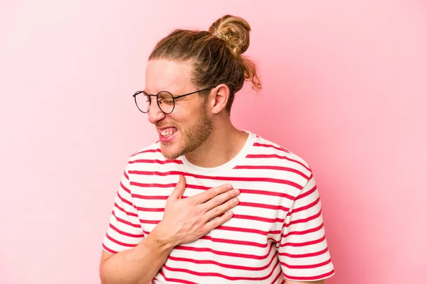 Young Caucasian Man Isolated Pink Background Laughing Keeping Hands Heart — Stock Photo, Image